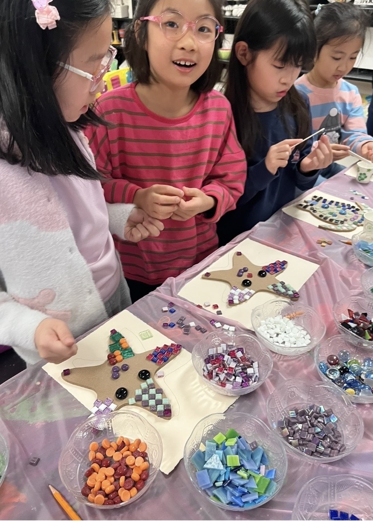 Kids making mosaics