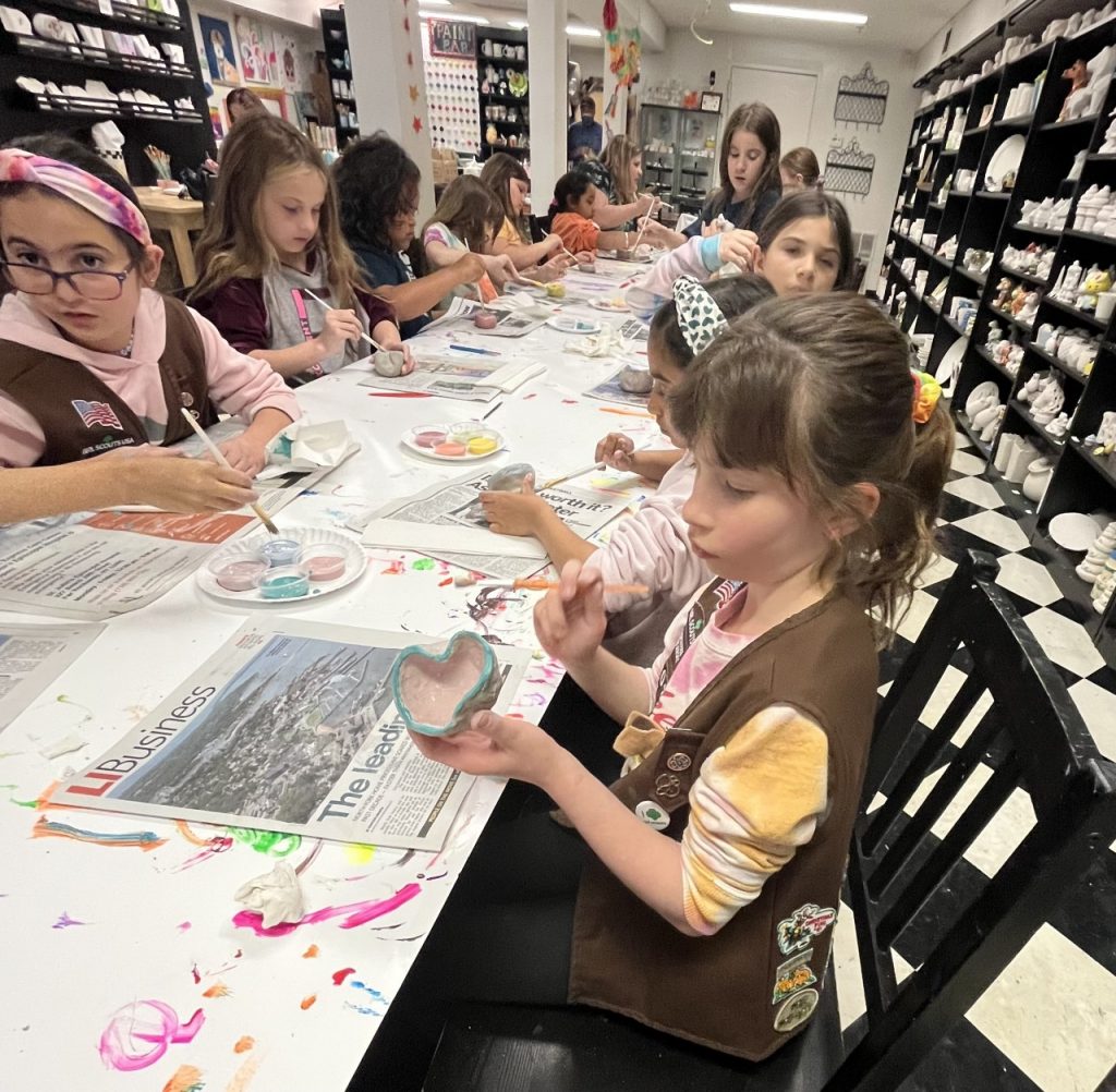 Young artists at work, immersed in a clay party, showcasing their imaginative sculptures in Bergen County